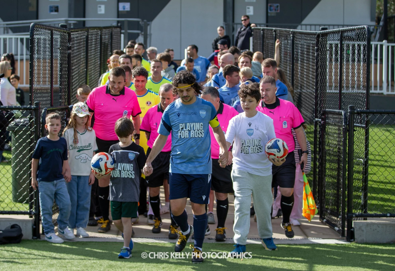 Playing for Ross charity match begins