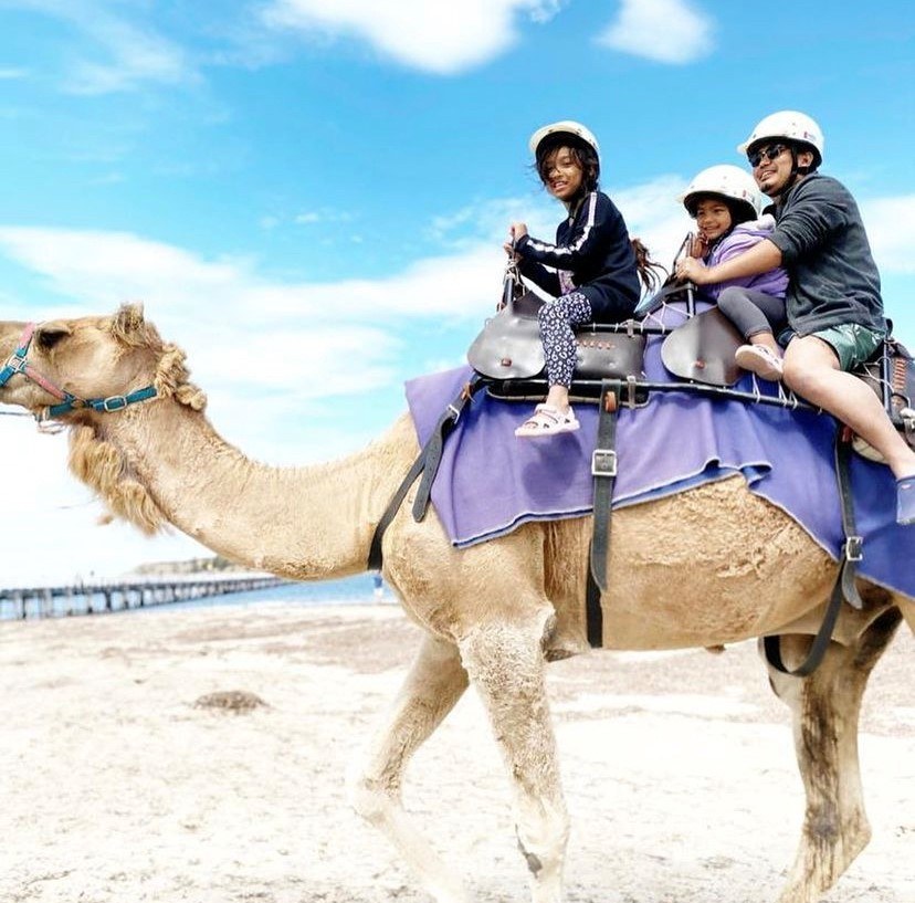 Audrey's family on a camel