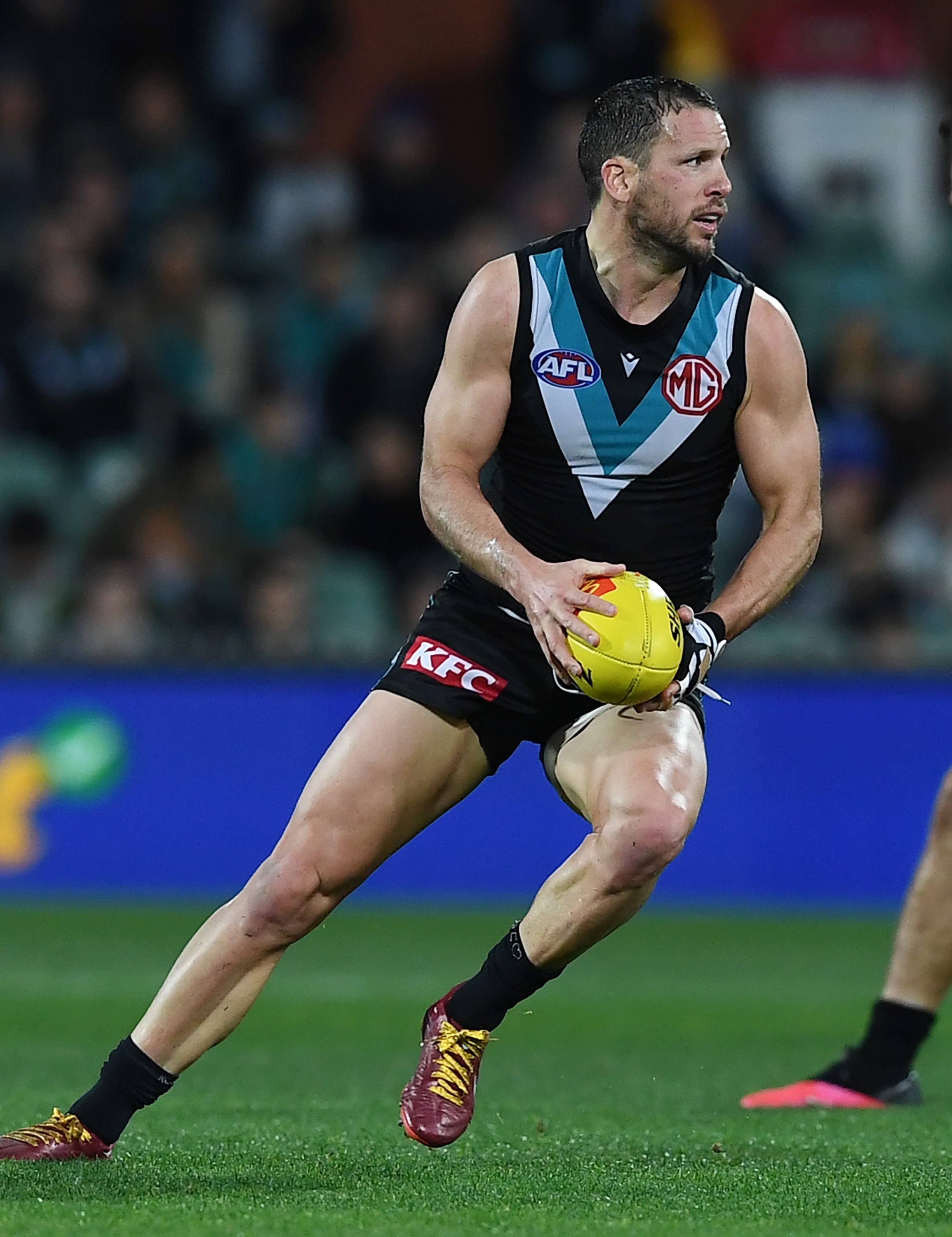 PAFC Travis Boak wearing gold shoelaces for childhood cancer
